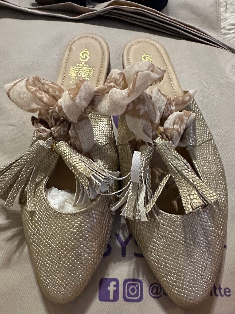 Gold Textured Slip-On Mules with Tassel and Scarf Detail